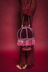 KEEP THE LIGHTS OFF TASSEL PURSE