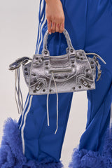 TO THE CITY PURSE