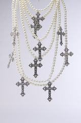PROTECTED LAYERED CROSS NECKLACE
