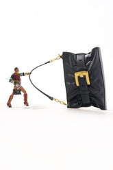 OVERSEAS BUCKLE CLUTCH