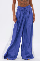 BREAKING THE RULES TRACK PANT IN ROYAL BLUE
