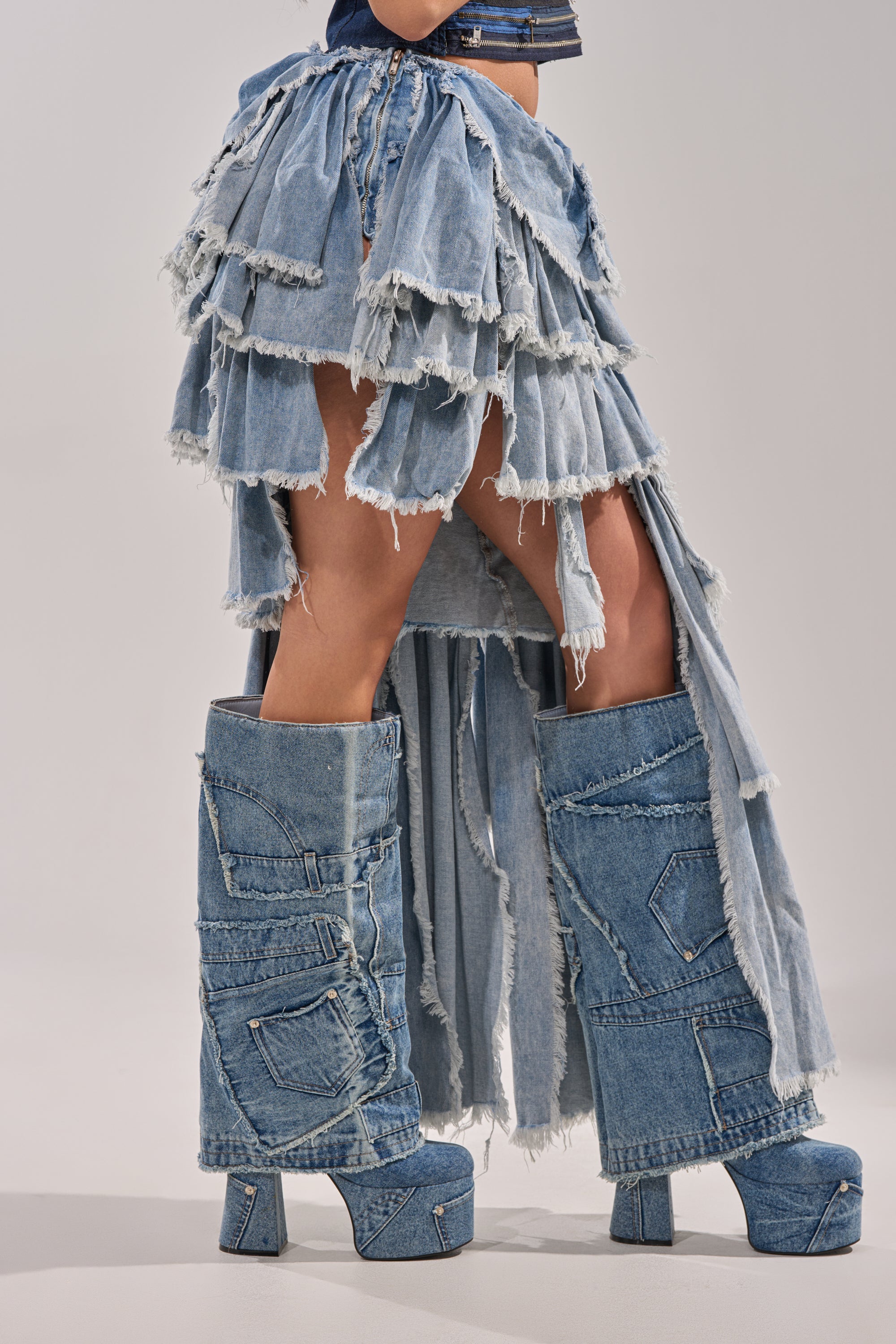 DISTRESSED TIERED ASYMMETRIC MIDI SKIRT