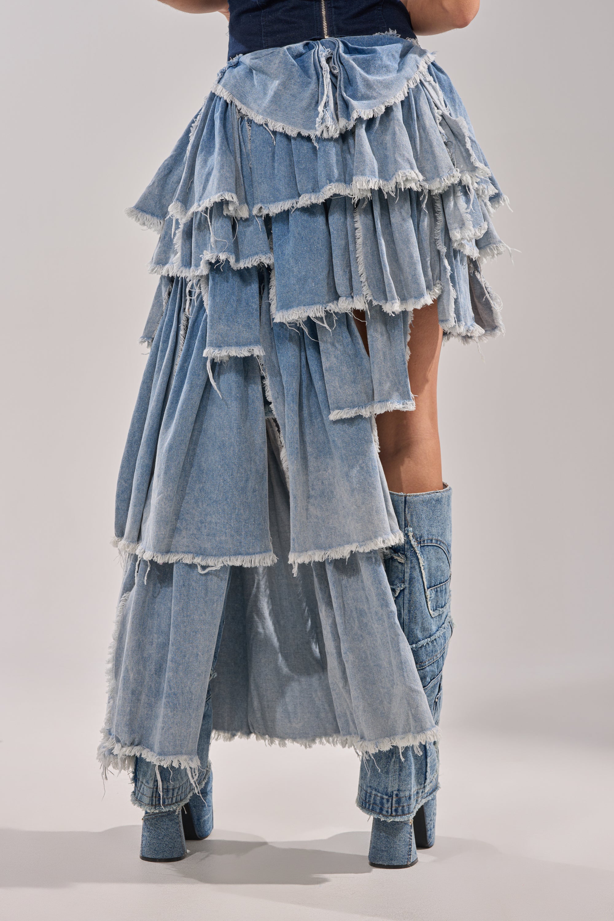 DISTRESSED TIERED ASYMMETRIC MIDI SKIRT