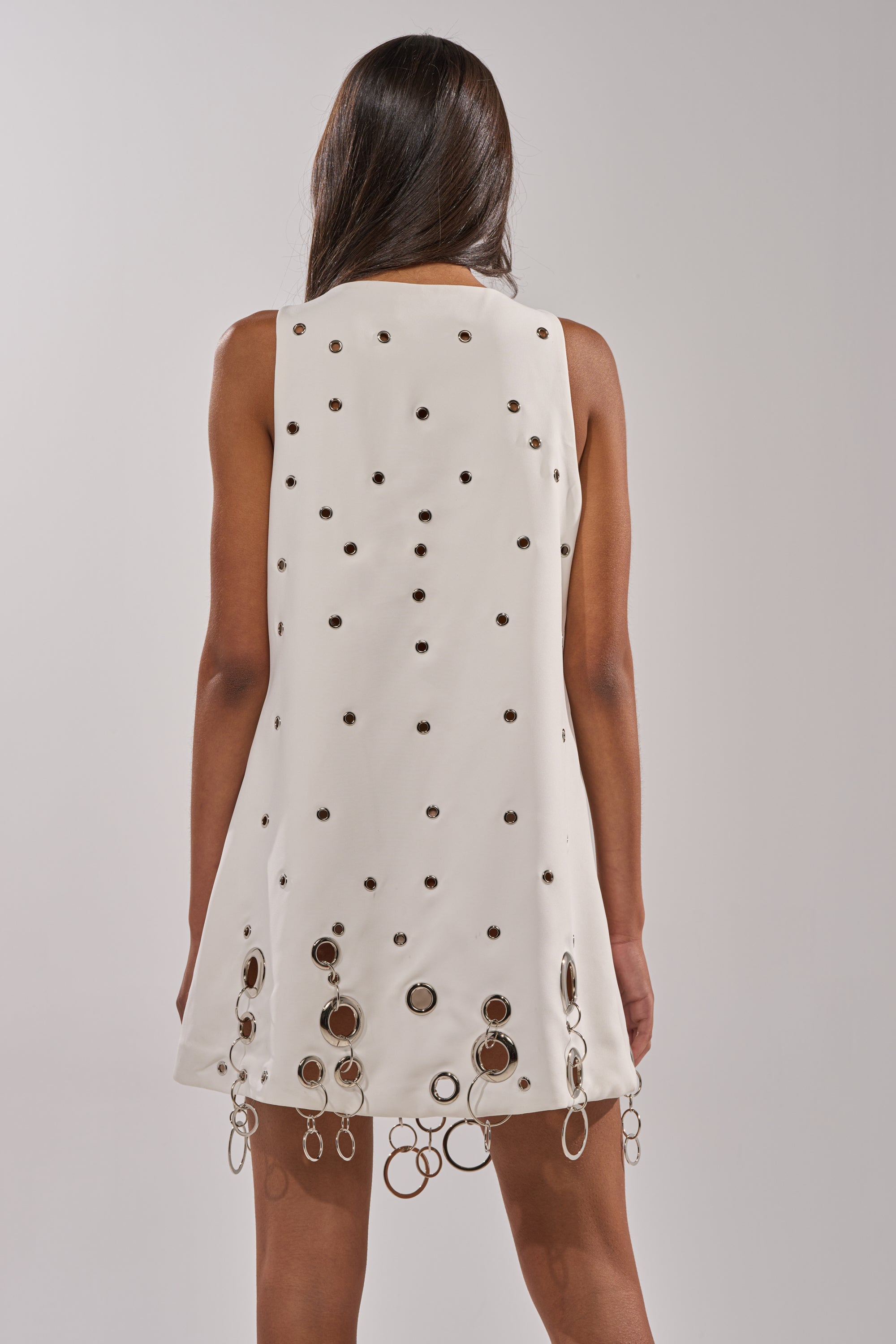 ONE OF A KIND MINI DRESS WITH METAL HARDWARE IN WHITE