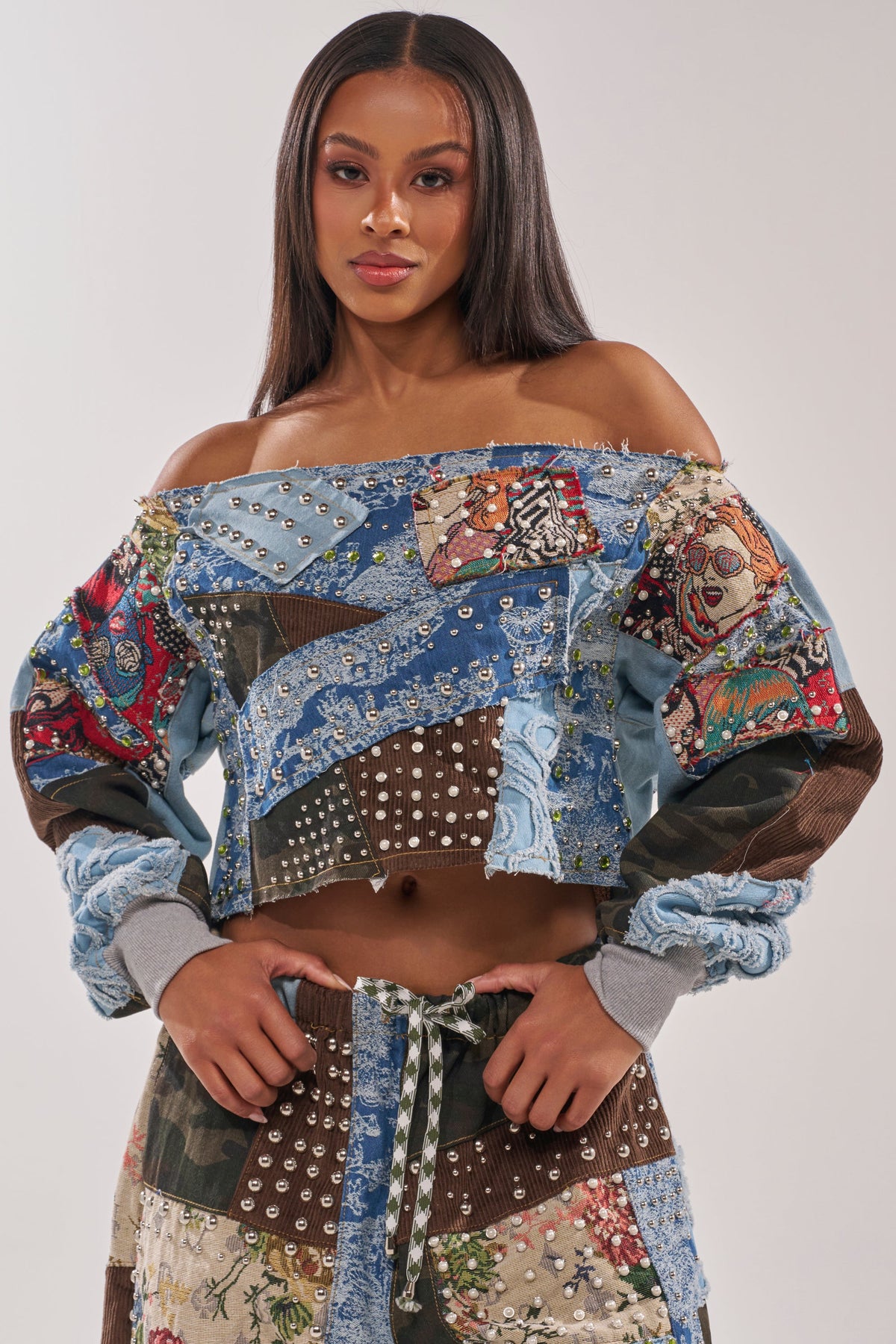CALL ME CRAZY PATCHWORK OFF THE SHOULDER SWEATSHIRT