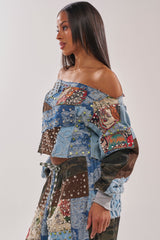 CALL ME CRAZY PATCHWORK OFF THE SHOULDER SWEATSHIRT
