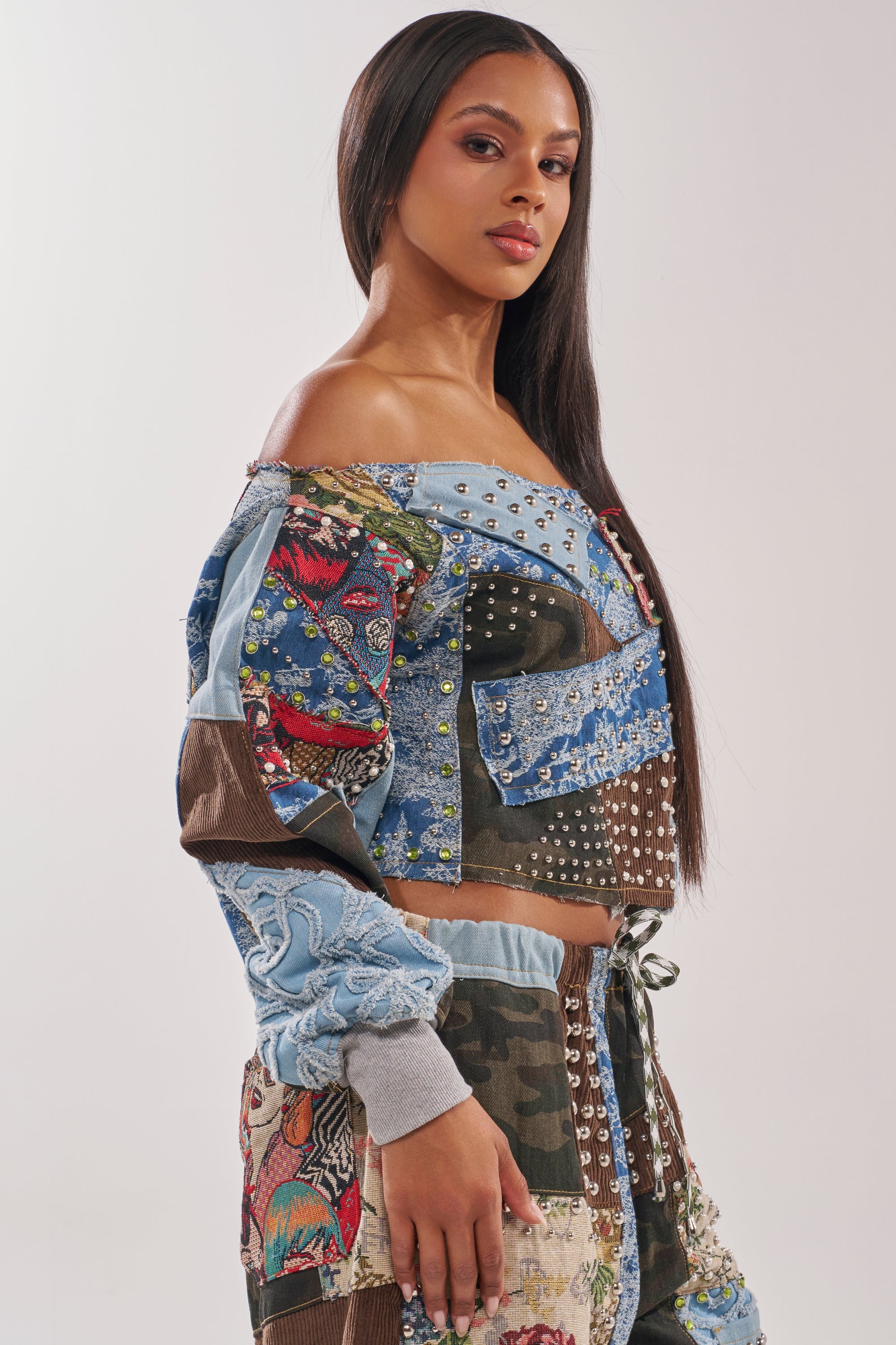 CALL ME CRAZY PATCHWORK OFF THE SHOULDER SWEATSHIRT