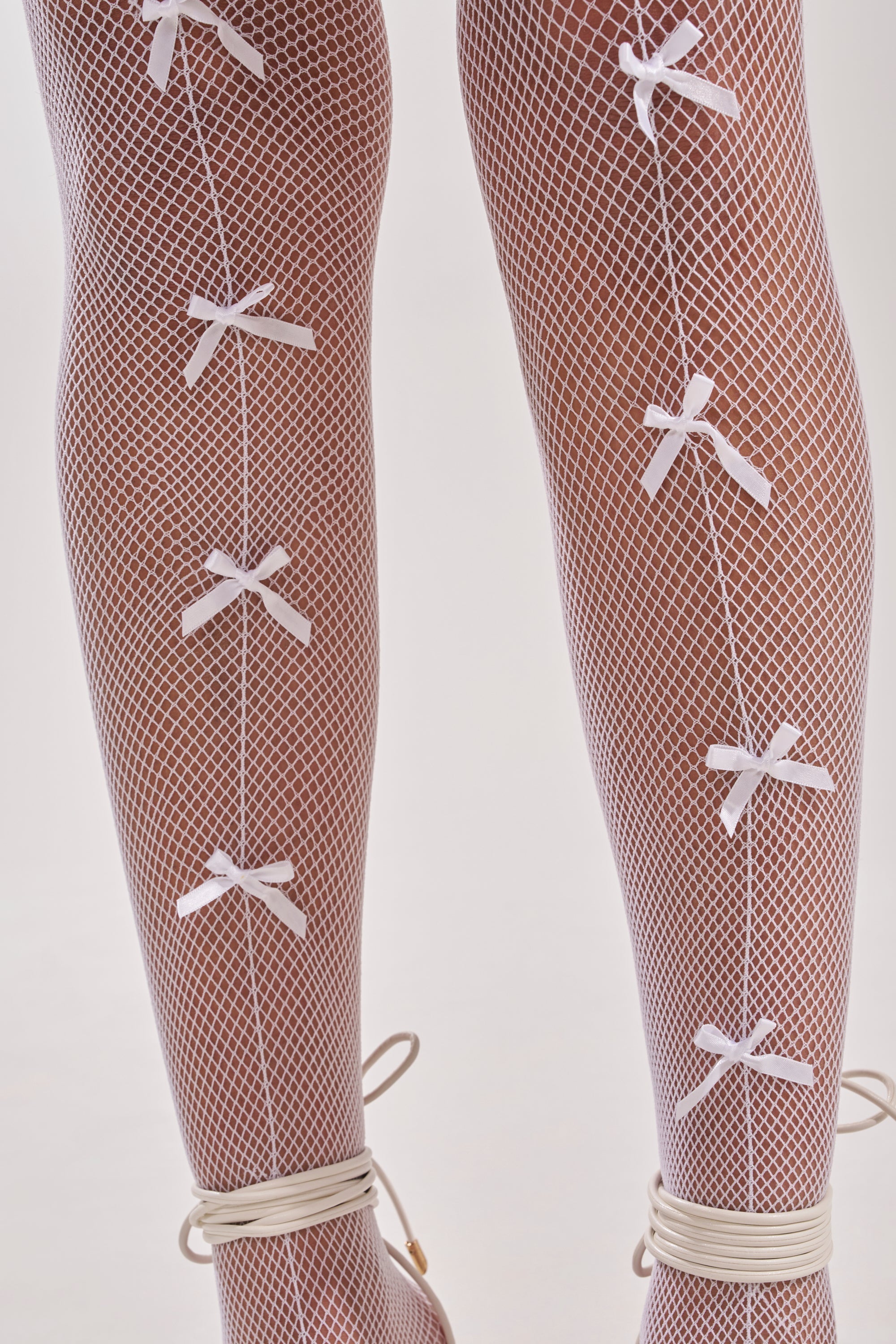 WITH A BOW TIGHTS