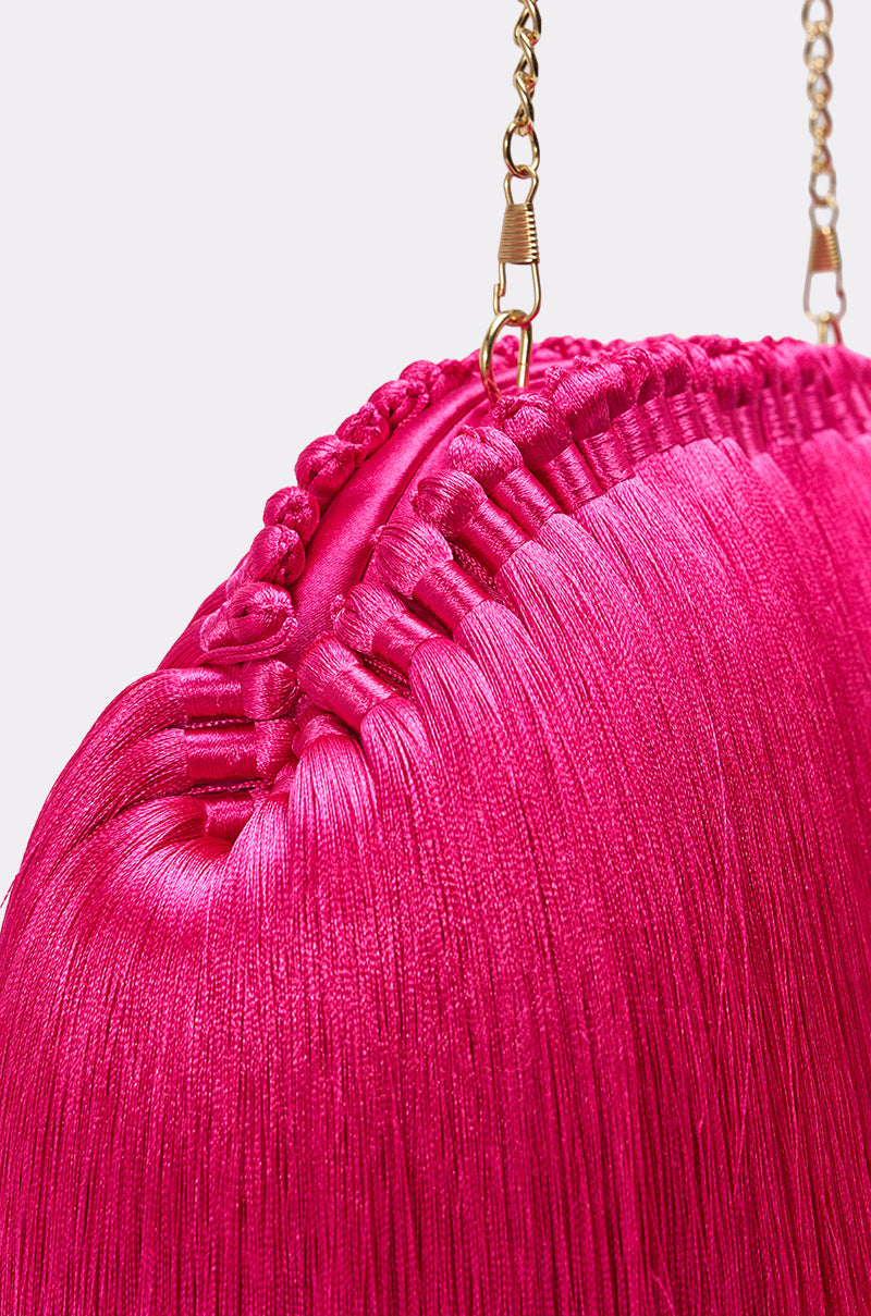RAZZLE DAZZLE TASSEL CLUTCH