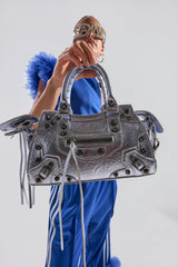 TO THE CITY PURSE