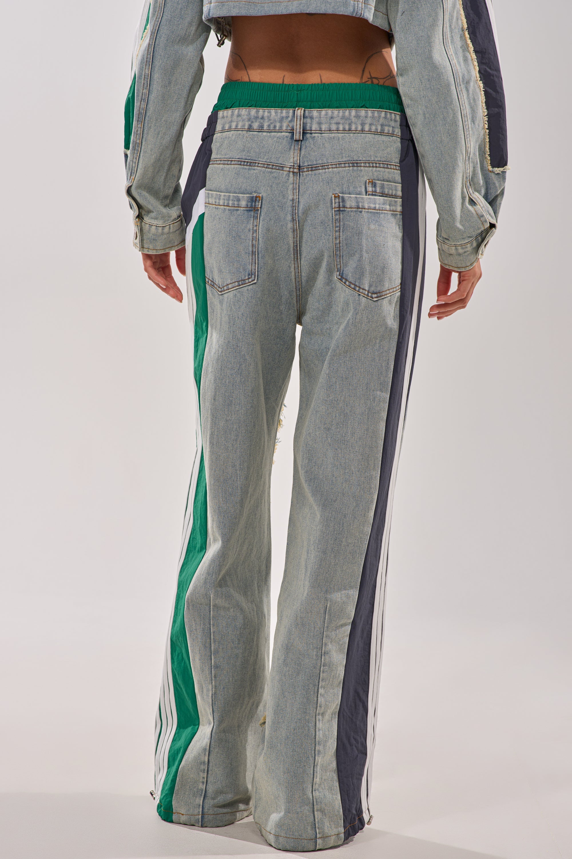 ALL AROUND THE WORLD PATCHWORK DENIM JOGGER PANT IN GREEN MULTI