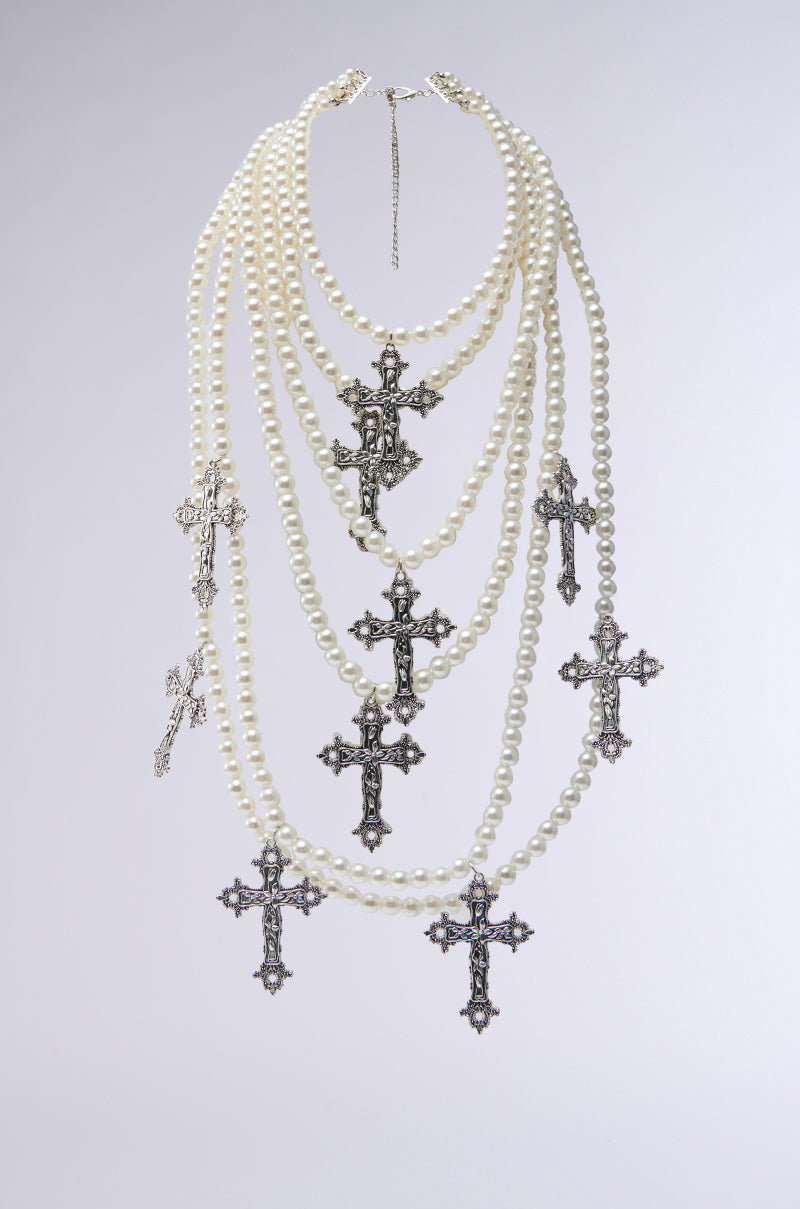 PROTECTED LAYERED CROSS NECKLACE