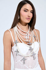 PROTECTED LAYERED CROSS NECKLACE