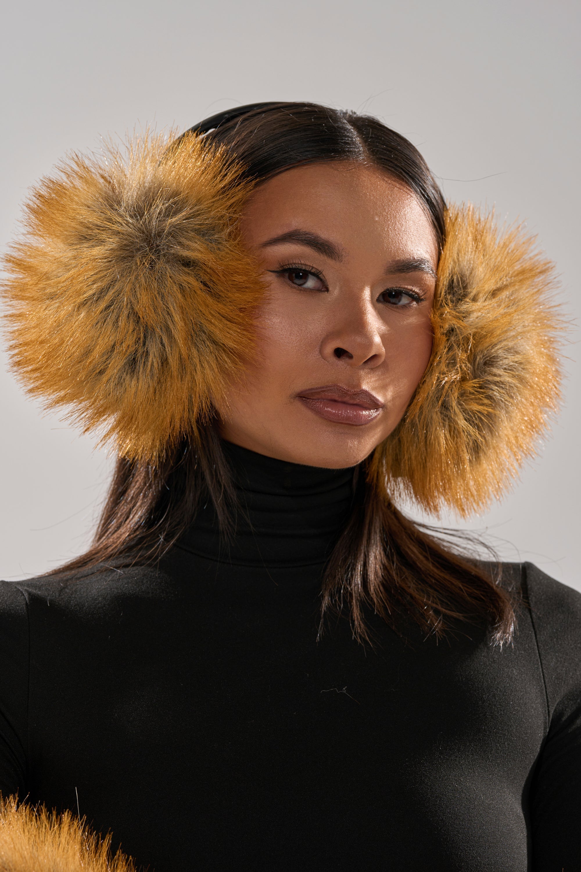 REALLY LIKE THAT FAUX FUR EARMUFFS