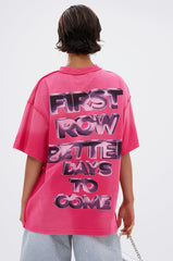 FIRST ROW POST HUMAN OVERSIZED GRAPHIC TEE IN PINK