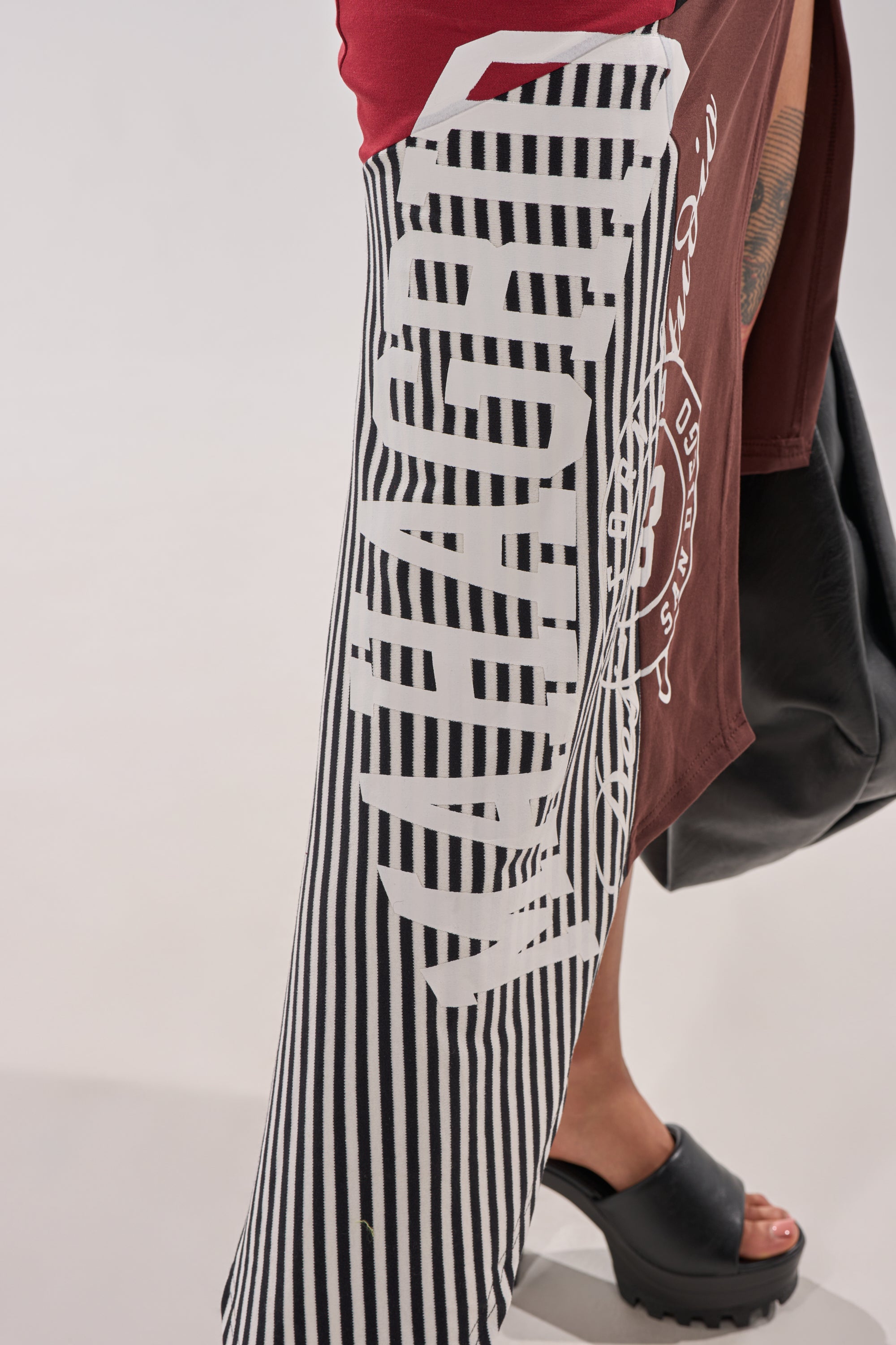 SCHOOL SPIRIT REWORKED MIDI SKIRT
