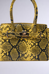 NEVER TYPICAL SNAKE PRINT PURSE