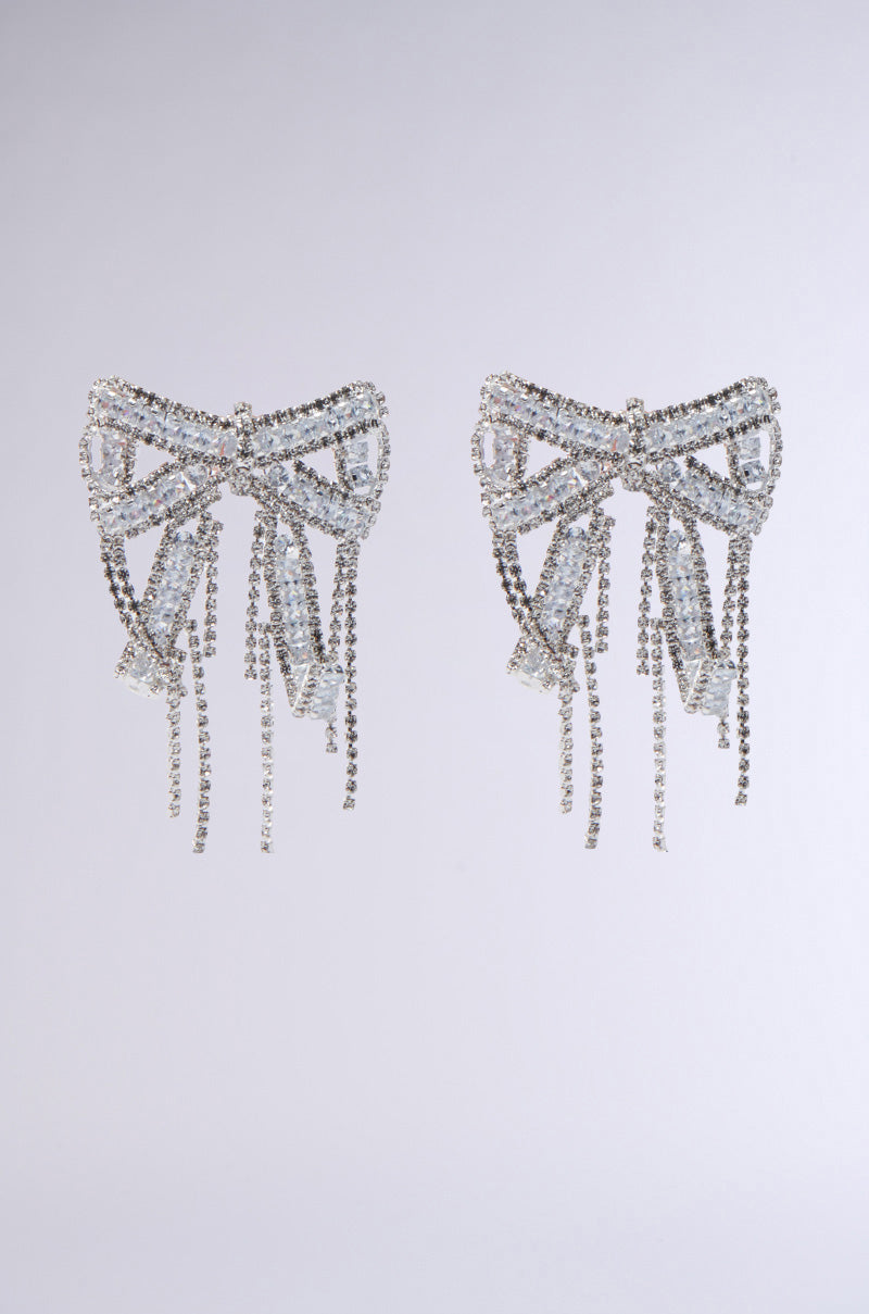 WITH A BOW EARRING