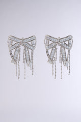 WITH A BOW EARRING