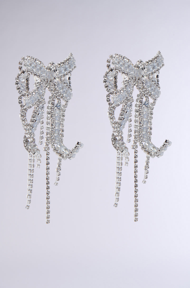 WITH A BOW EARRING