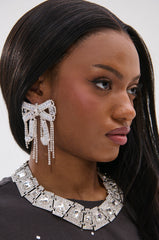 WITH A BOW EARRING