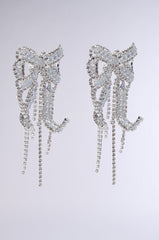 WITH A BOW EARRING