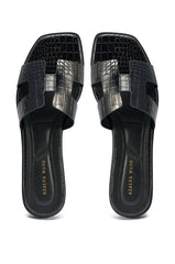 AKIRA HOWDY BLACK CROC SLIP ON FLAT SANDAL