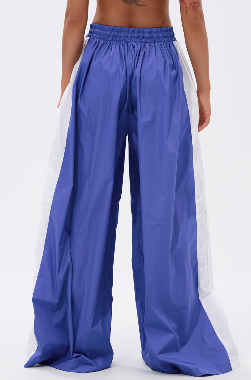 BREAKING THE RULES TRACK PANT IN ROYAL BLUE