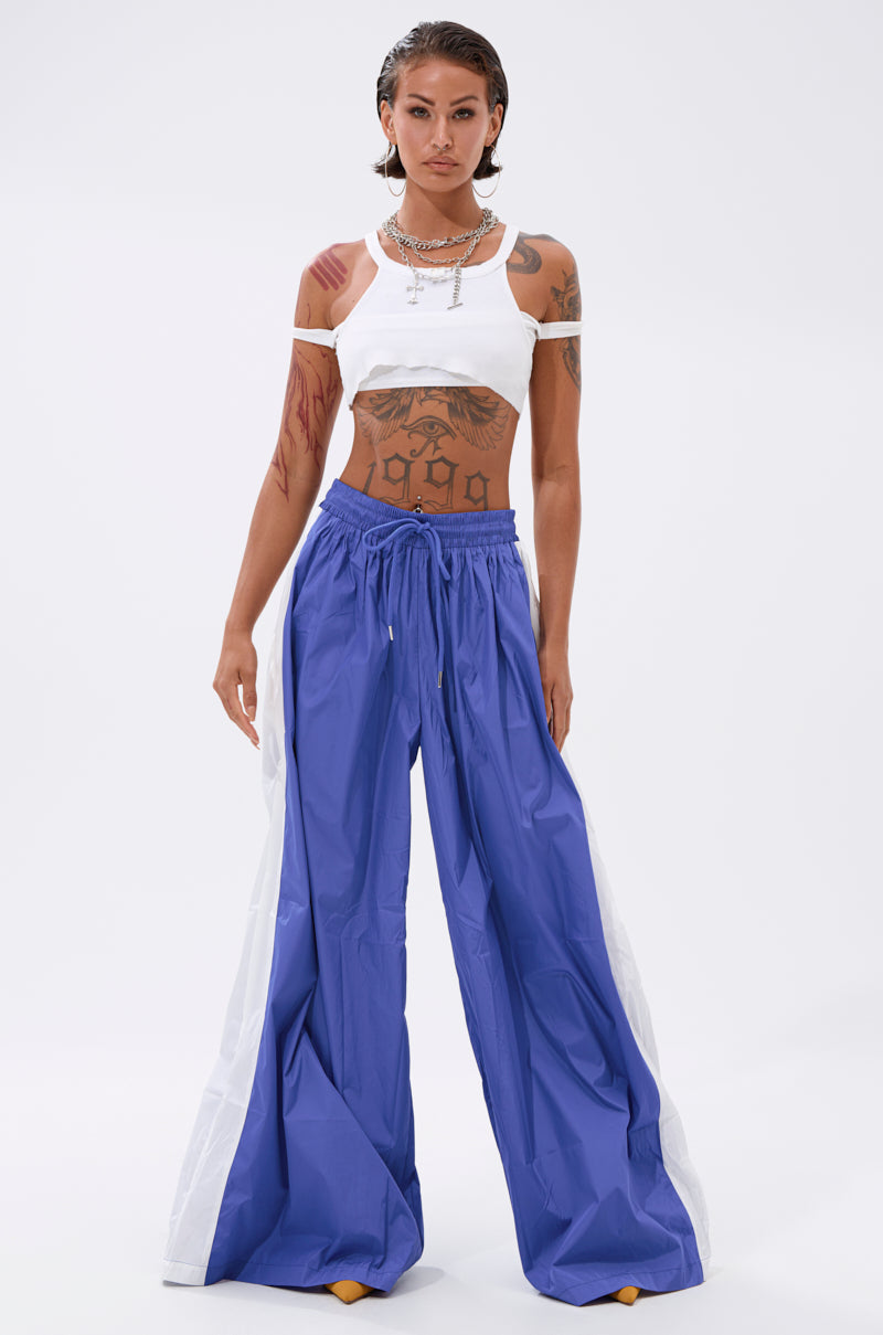 BREAKING THE RULES TRACK PANT IN ROYAL BLUE