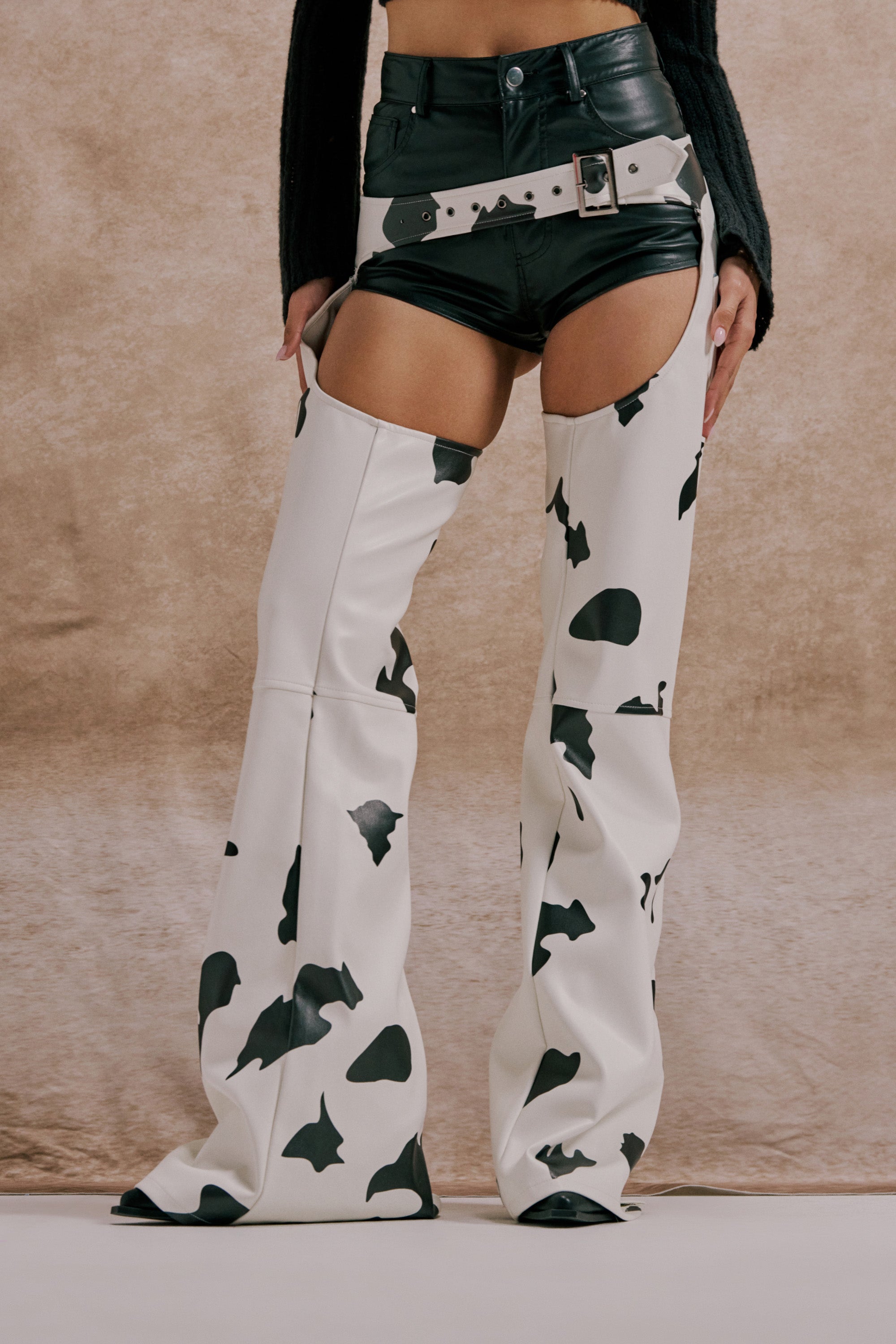MOO OVER COW PRINT FAUX LEATHER CHAPS
