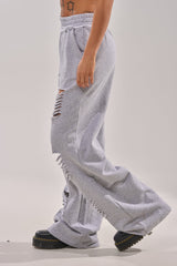 CROSSED OUT DISTRESSED WIDE LEG JOGGER