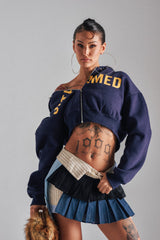 UNTAMED METAL RING SWEATSHIRT