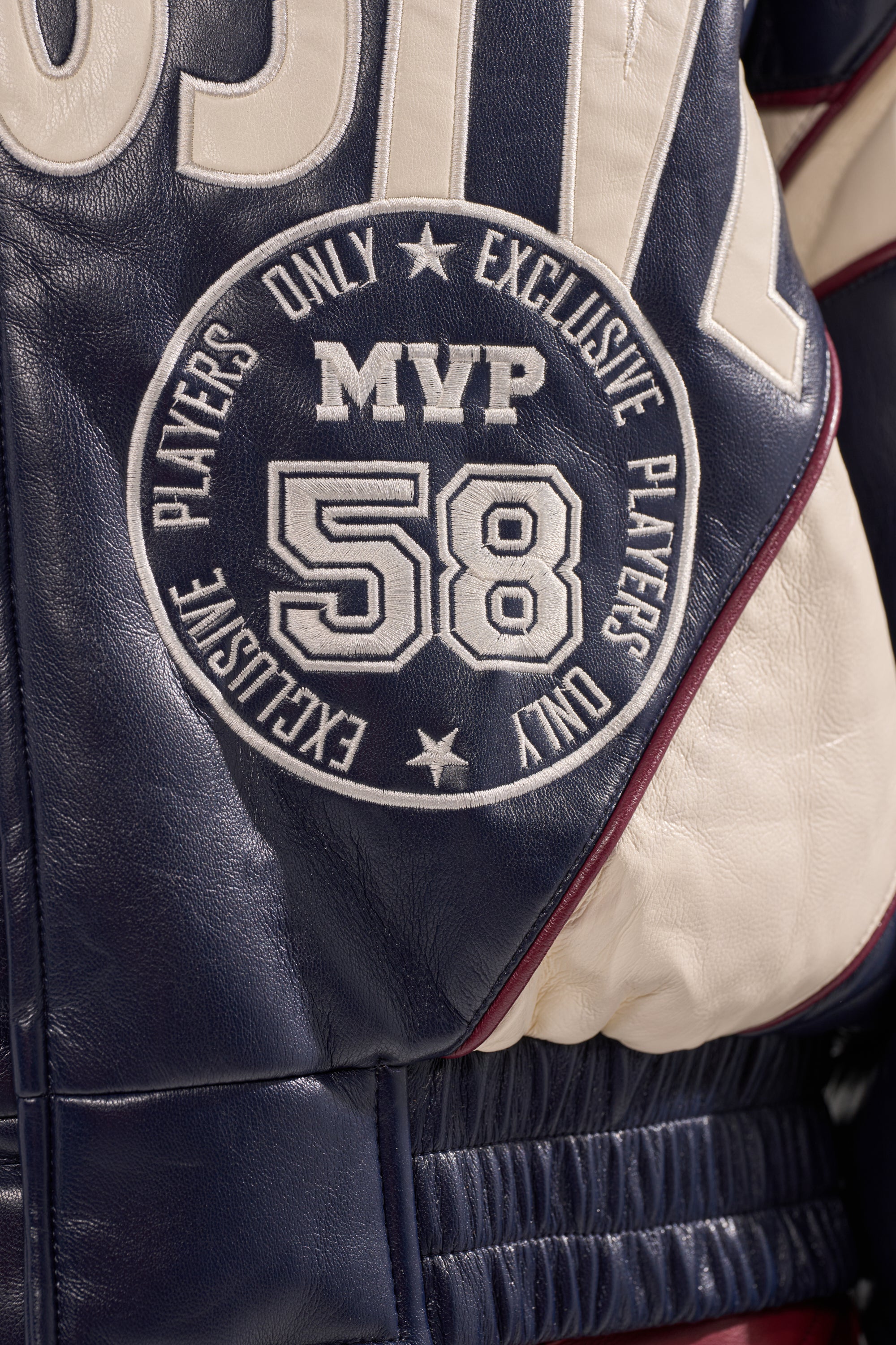 BUTTER LUXE VARSITY BOMBER