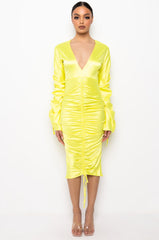 TALK ABOUT IT LOW V NECK RUCHED MIDI DRESS